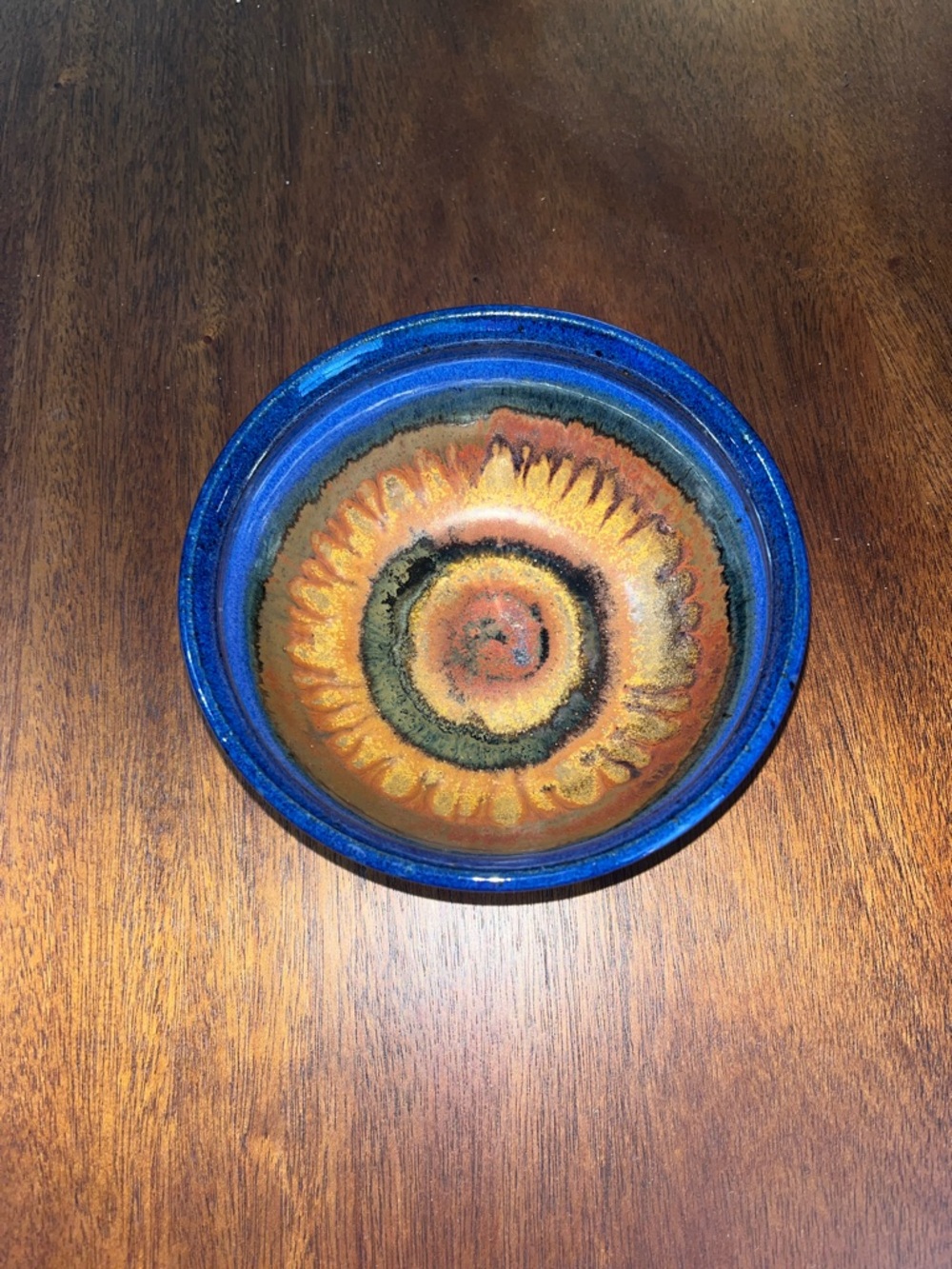 Vintage Artisan Ceramic Bowl in Blue and Orange Sunburst Glaze
